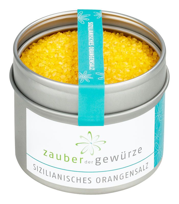 Runde Dose mit Orangensalz. Türkisfarbenes Band mit Schriftzug. Aufschrift: Zauber der Gewürze Sizilianisches Orangensalz.