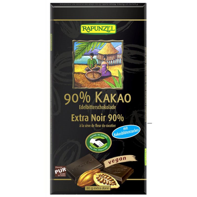Dunkle Schokoladentafel mit Aufschrift 90% Kakao. Marke Rapunzel. Vegan. Mit Kokosblütenzucker. Abbildung von Kakaobohnen und Schokoladenstücken.