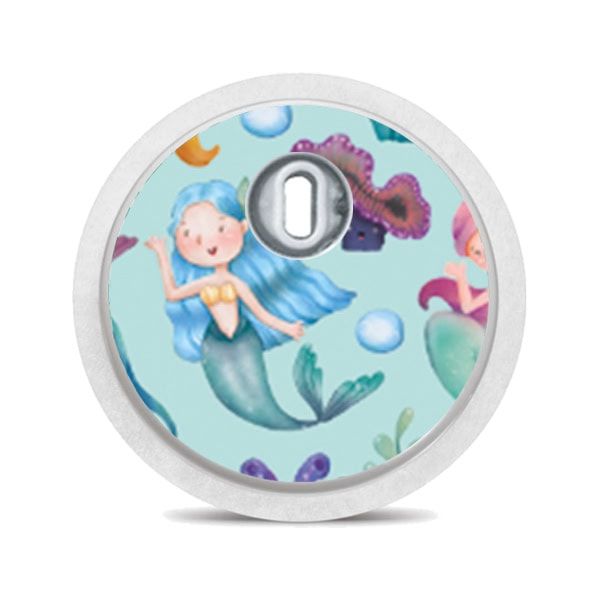 Runder Aufkleber mit Meerjungfrau-Motiv auf einem Sensor. Weißer Rand, Loch für den Sensor.