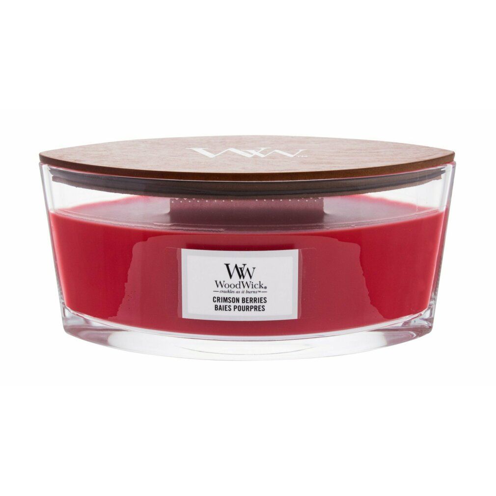 Elliptische Kerze mit Holzdeckel. Rotes Wachs in Glasbehälter. Etikett mit 'Crimson Berries'.