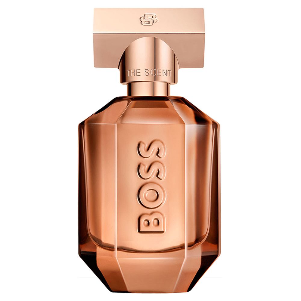 Kupferfarbener Parfümflakon. Achteckige Form, goldfarbener Verschluss. Aufschrift BOSS. Produktname: The Scent.