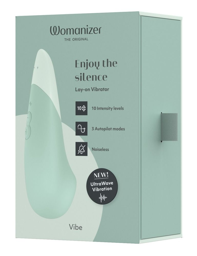 Mintfarbener Vibrator in Verpackung. Aufschrift: Womanizer, Enjoy the silence, 10 Intensitätsstufen, 3 Modi, geräuschlos, UltraWave Vibration.