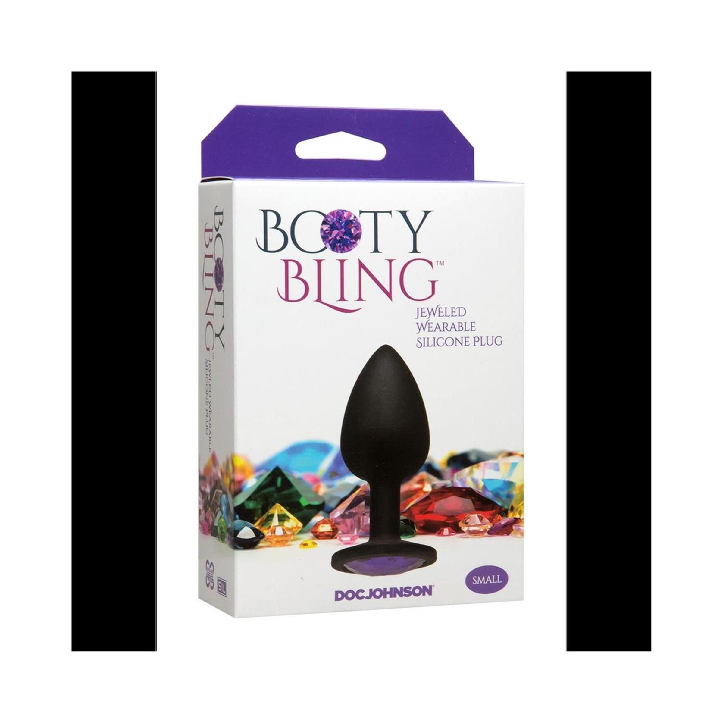 Schwarzer Butt Plug in Verpackung. Aufschrift: Booty Bling, Jeweled Wearable Silicone Plug. Marke: Doc Johnson. Größe: Small.
