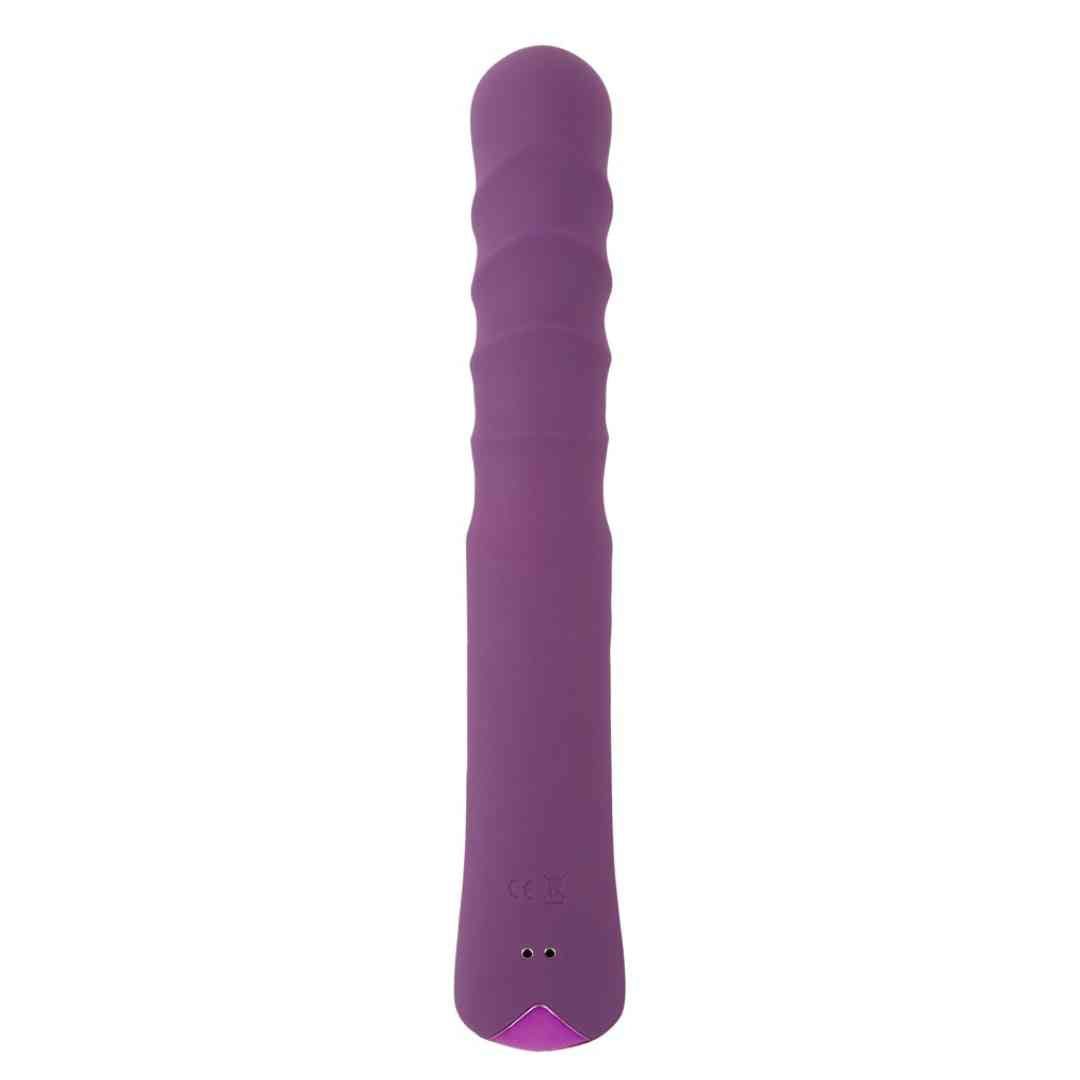 Lila Vibrator mit geriffelter Oberfläche. Mit einer runden Spitze.