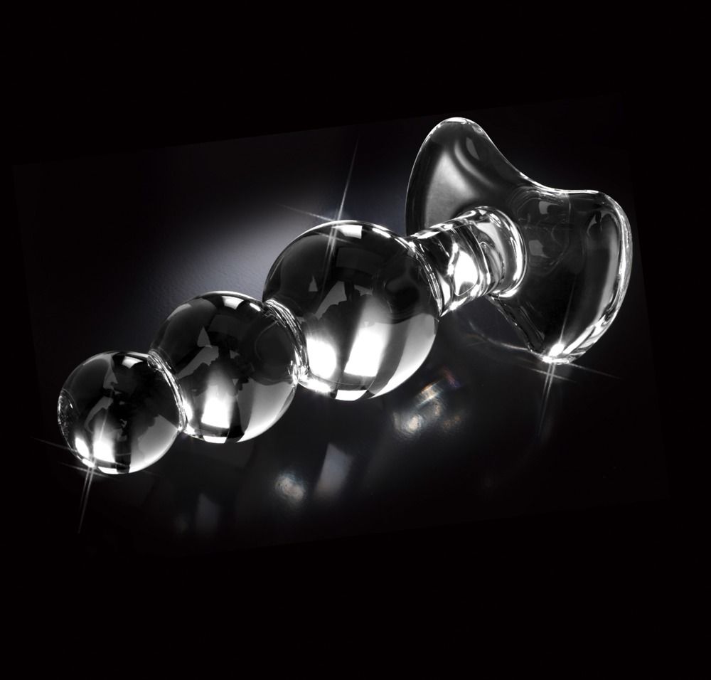 Glas-Plug mit vier Kugeln und breiter Basis, seitliche Ansicht.