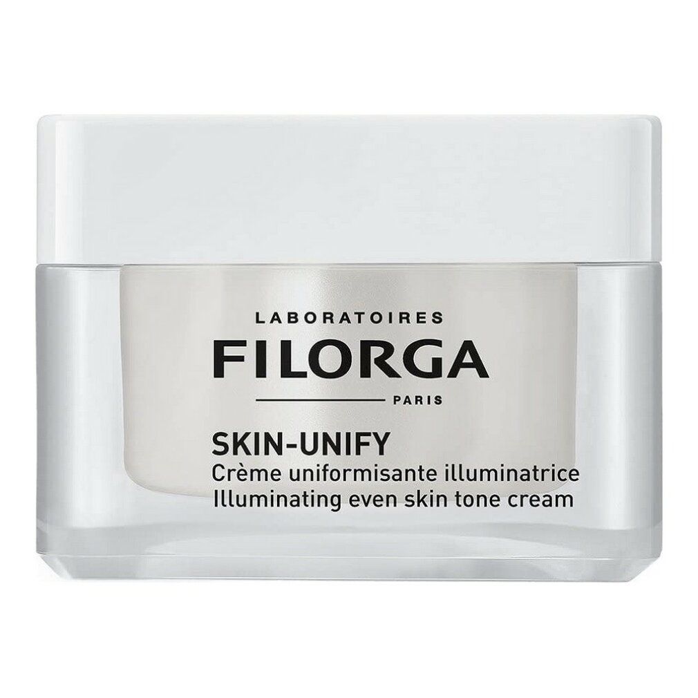 Creme-Tiegel mit weißem Deckel. Aufschrift: FILORGA SKIN-UNIFY. Klare Verpackung.