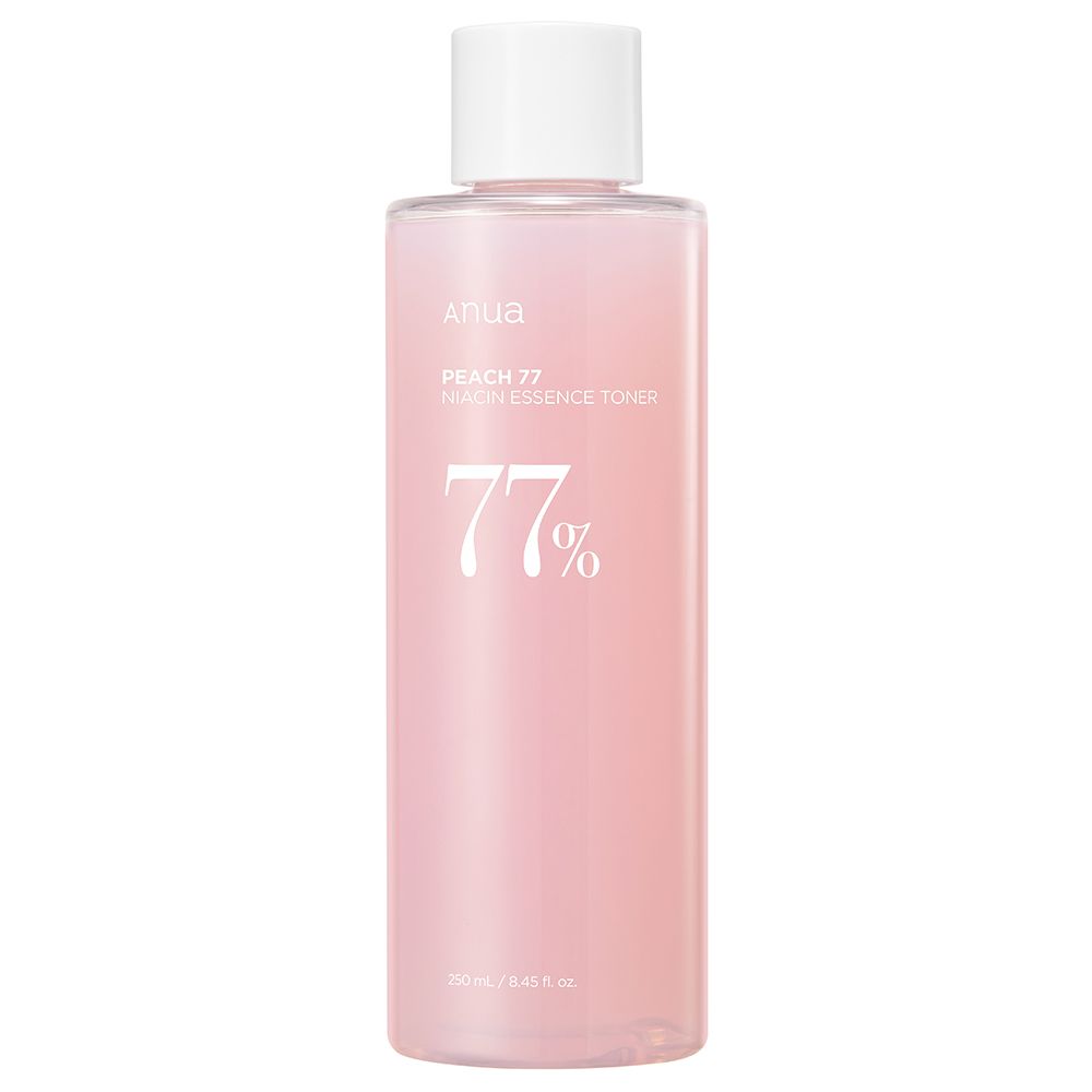 Eine Flasche ANUA Peach 77% Niacin Essence Toner mit weißem Deckel.