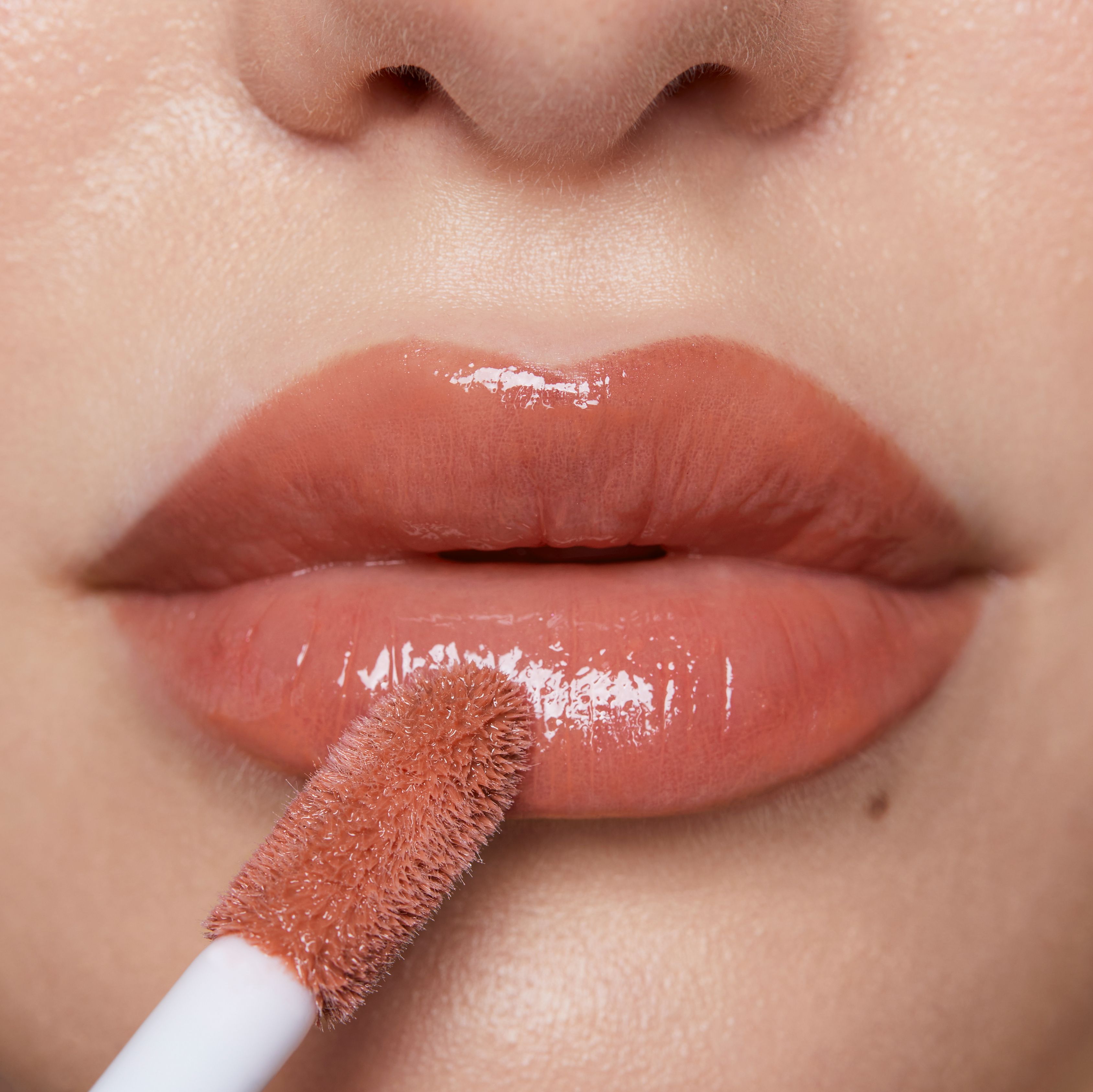 Plumpy Lip Gloss - Feuchtigkeitsspendende Pflege mit Volumeneffekt