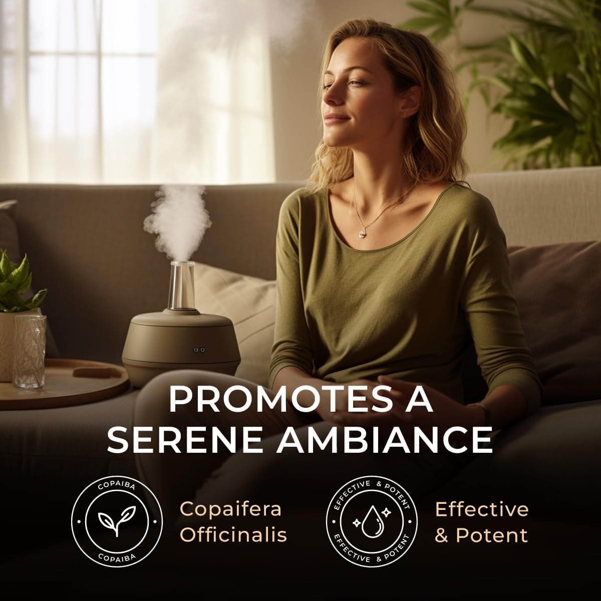 Frau sitzt auf Sofa, Augen geschlossen. Nebel aus einem Diffusor. Text: Promotes a serene ambiance. Logos: Copaiba, Effective & Potent.