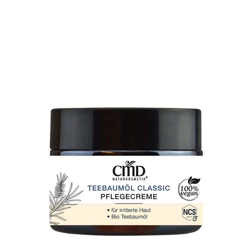 Creme-Tiegel mit schwarzem Deckel. Aufschrift: CMD Naturkosmetik, Teebaumöl Classic Pflegecreme, 100% vegan. Für irritierte Haut und Bio Teebaumöl.
