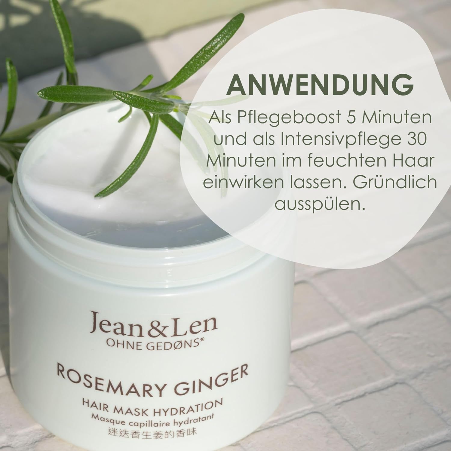 Weißes Tiegel Jean & Len Rosemary Ginger Hair Mask. Text: Anwendung: 5 Minuten Pflegeboost, 30 Minuten Intensivpflege. Gründlich ausspülen.
