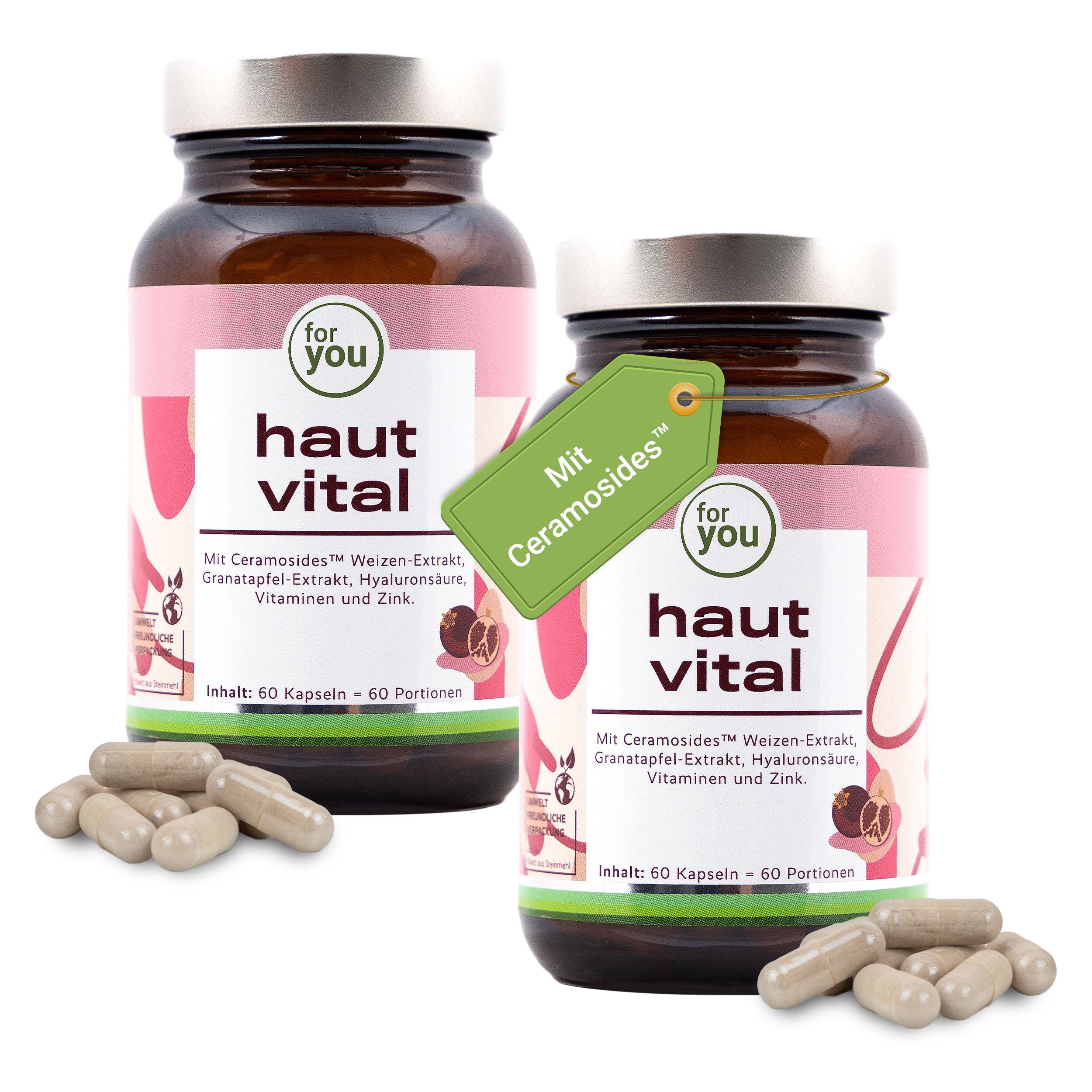 Zwei Flaschen Haut Vital Nahrungsergänzungsmittel mit Kapseln. Eine Flasche mit Anhänger.