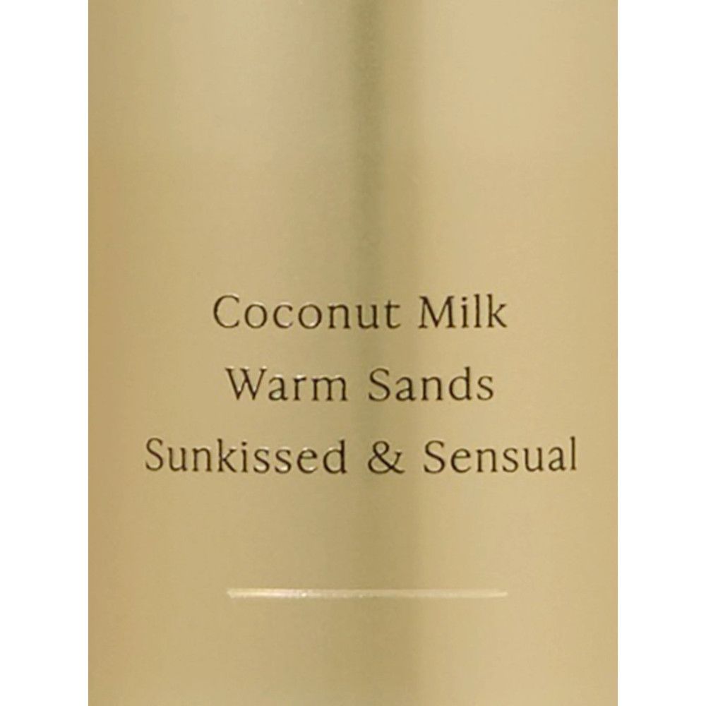 Goldfarbene Flasche mit Text: Coconut Milk, Warm Sands, Sunkissed & Sensual.