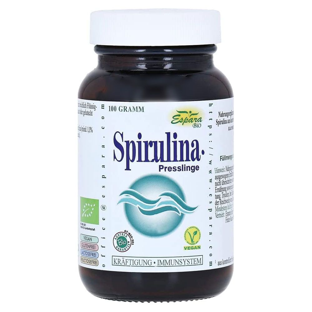 Braune Glasflasche mit weißem Deckel. Etikett mit "Espara Bio Spirulina Presslinge". Bio-Siegel, Vegan-Siegel.