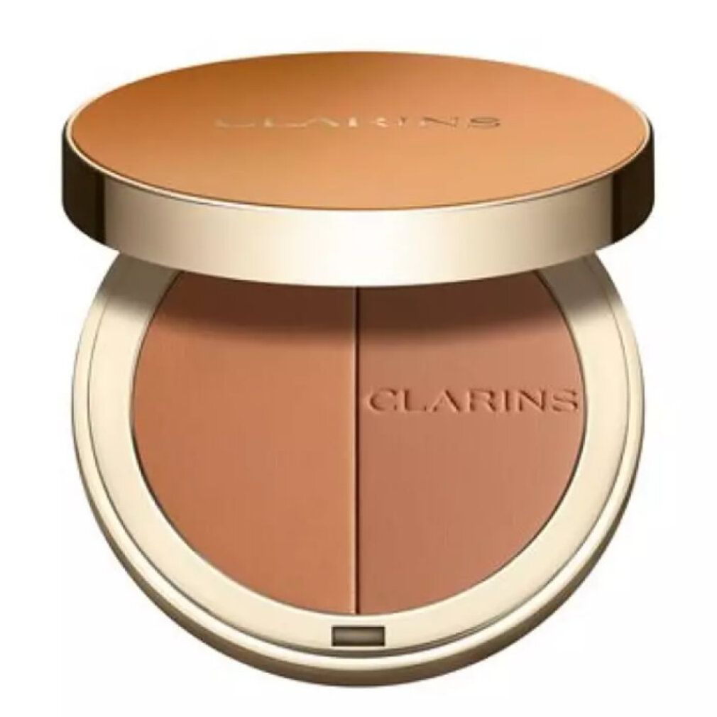 Runder Bronzer-Kompaktpuder mit zwei Farbtönen. Deckel und Puder in Braun- und Goldtönen. Marke Clarins.