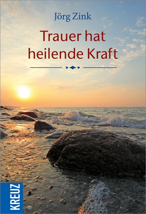 Buchcover mit Titel "Trauer hat heilende Kraft" von Jörg Zink. Meerlandschaft mit Felsen und Sonnenuntergang.
