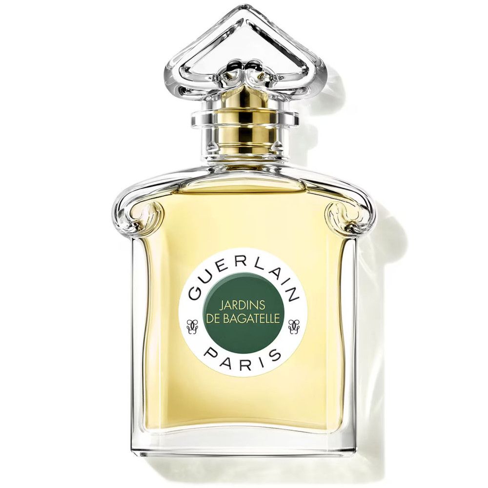 Parfümflakon mit gelber Flüssigkeit. Aufkleber mit "GUERLAIN JARDINS DE BAGATELLE PARIS". Glasflakon mit transparentem Deckel.