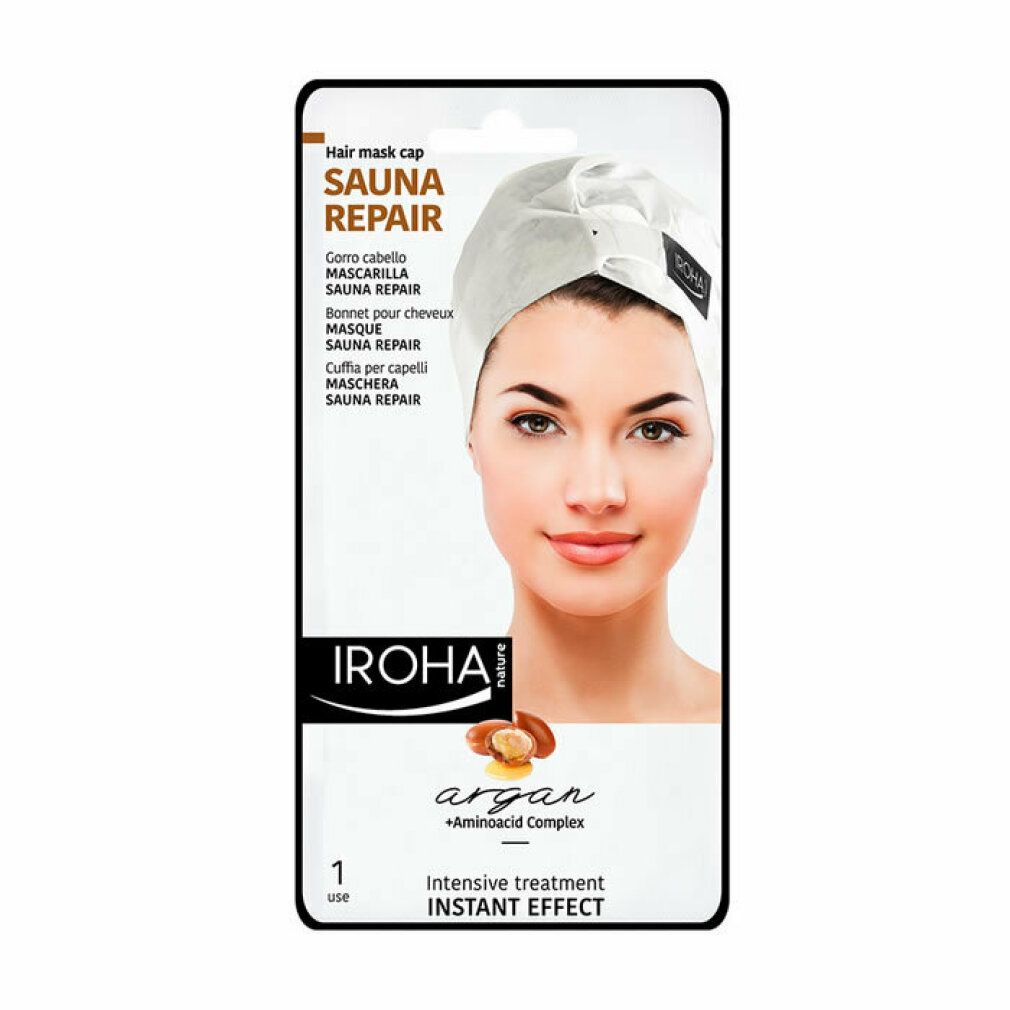 Verpackung mit Iroha Hair Mask Argan. Aufdruck: Sauna Repair, Argan + Aminoacid Complex. Frau mit Haarmaske. 1 Anwendung.