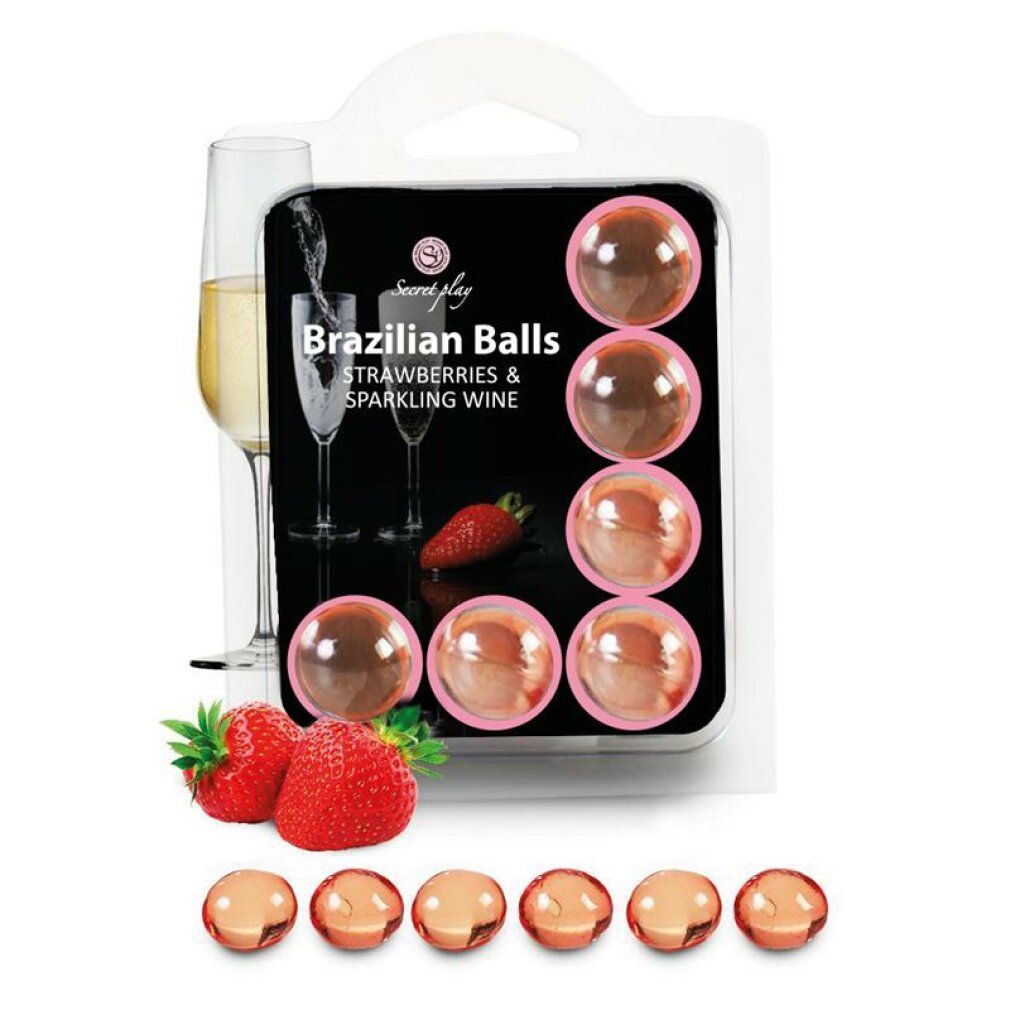 Verpackung mit 8 brasilianischen Kugeln in Erdbeer- und Sekt-Optik. Zwei Gläser Sekt und Erdbeeren sind abgebildet.