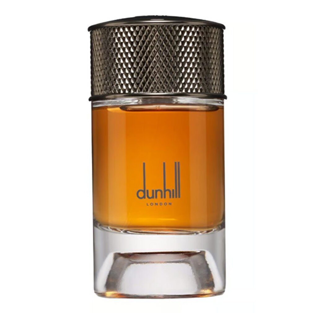 Parfümflakon mit silbernem Deckel, goldfarbener Flüssigkeit. Aufschrift Dunhill London.