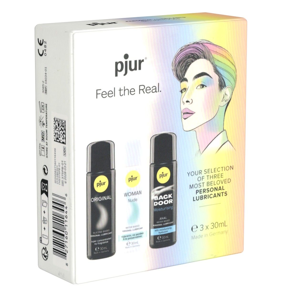 Verpackung mit drei Gleitmitteln. Aufdrucke: pjur, Original, Woman, Back Door. Illustration eines Mannes mit Regenbogen-Haarfarbe.