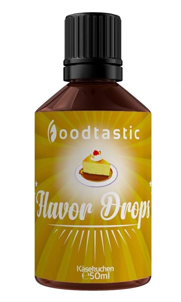 Braune Flasche mit schwarzem Deckel. Aufkleber mit "Foodtastic", Kuchen-Illustration und "Flavor Drops Käsekuchen".