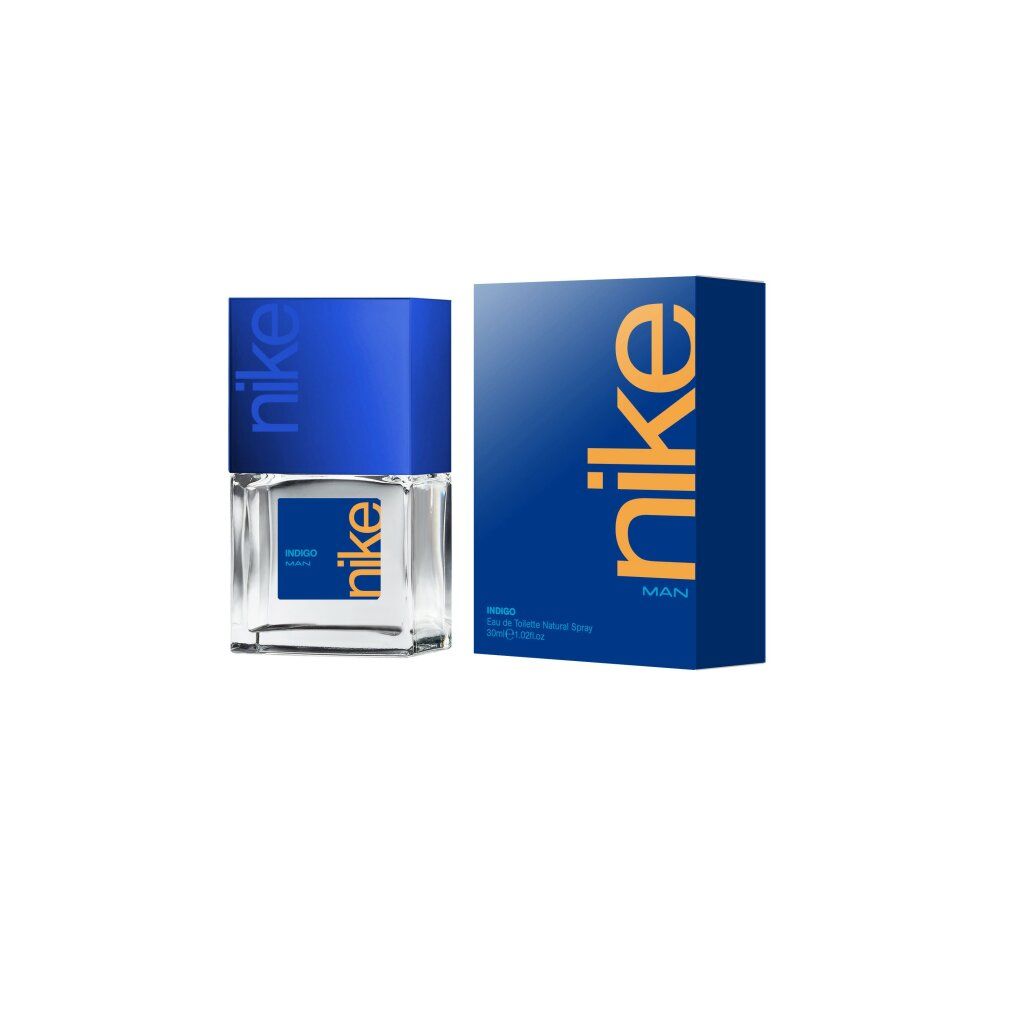 Nike Indigo Man Eau de Toilette. Flakon und Verpackung in Blau. Orangefarbener Schriftzug "nike".