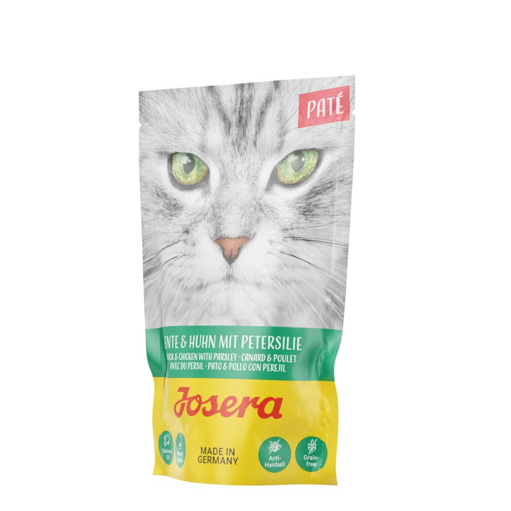 Josera Paté-Beutel. Aufdruck: Katze, Paté Ente & Huhn mit Petersilie. Gelb-grüne Verpackung. Made in Germany.