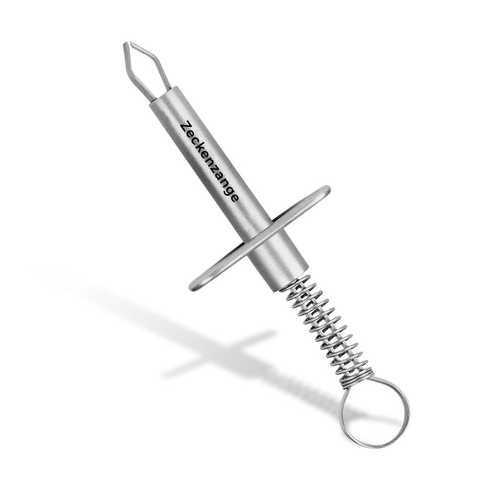 Metall-Zeckenzange mit Haltebügel und Feder. Der Griff hat einen Ring. Auf dem Griff steht "Zeckenzange".