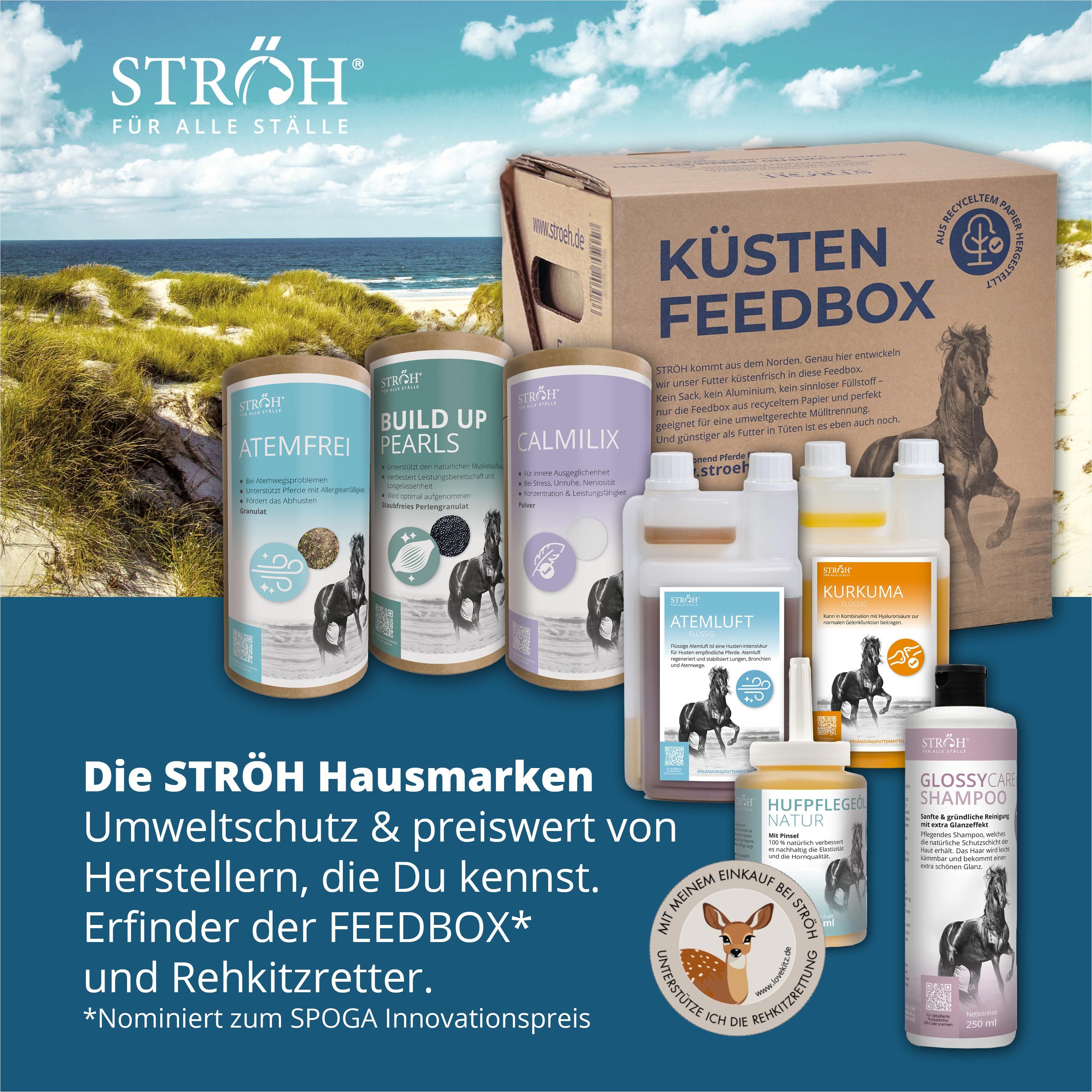STRÖH Produktübersicht am Strand: Feedbox und verschiedene Pflegeprodukte für Pferde.