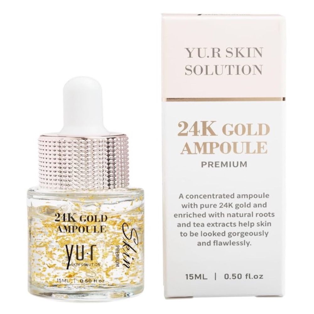 Serumflasche mit 24K Goldflocken und Verpackung. Aufschrift: 24K Gold Ampoule, Yu.R Skin Solution.