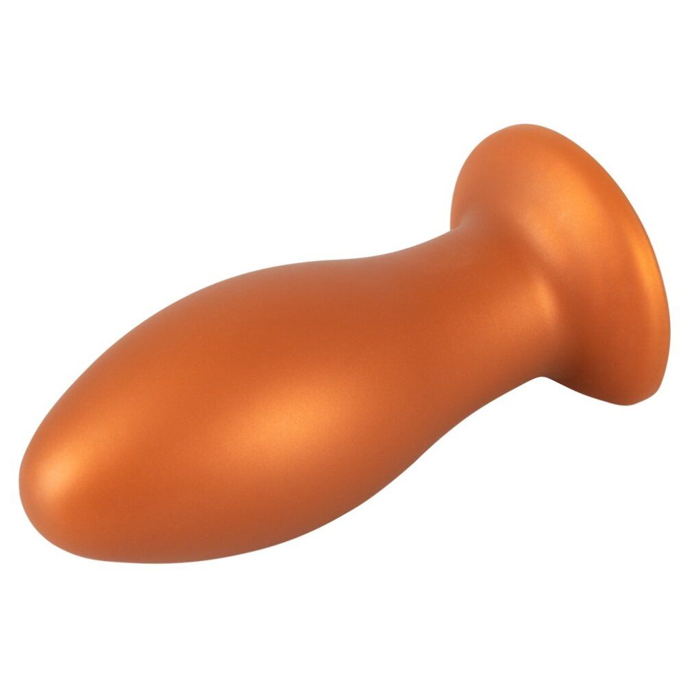 Orangefarbener, weicher Butt Plug. Runde Basis, konische Form. Glatte Oberfläche.
