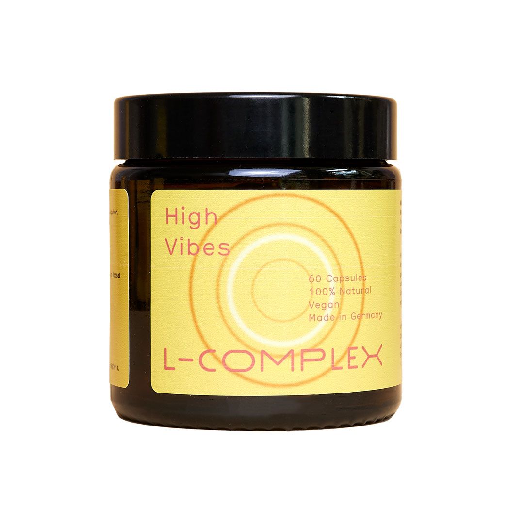Braune Glasdose mit schwarzem Deckel. Etikett mit "High Vibes" und "L-COMPLEX". Gelbes Etikett mit weißen Kreisen und Text.