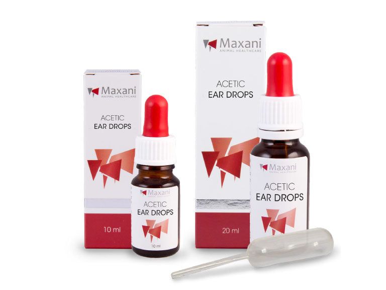Zwei Flaschen und Verpackungen. Rote Kappen. Tropfer. Beschriftung: Acetic Ear Drops, Maxani.