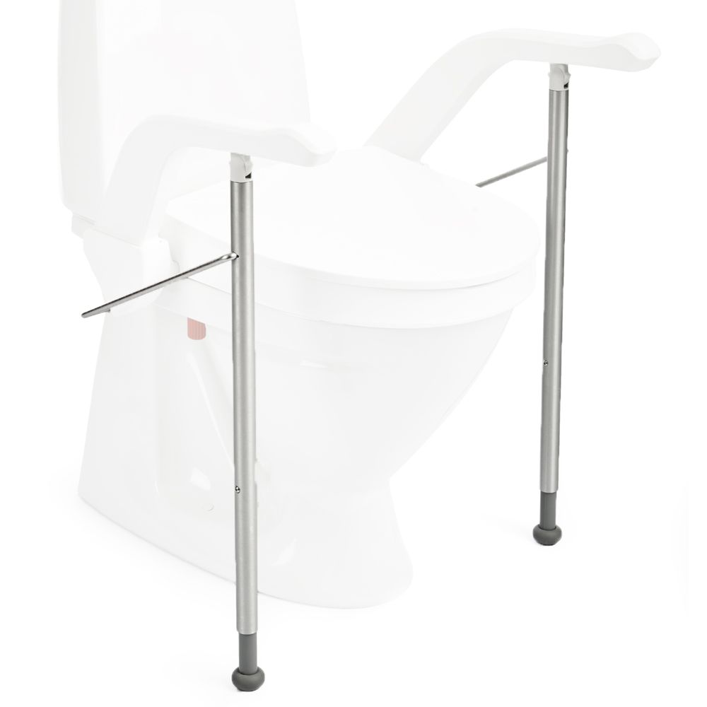 Zwei silberfarbene Stützbeine für Toilettensitzerhöhung. Verstellbare Höhe, graue Gummifüße. Montiert an einer weißen Toilette.