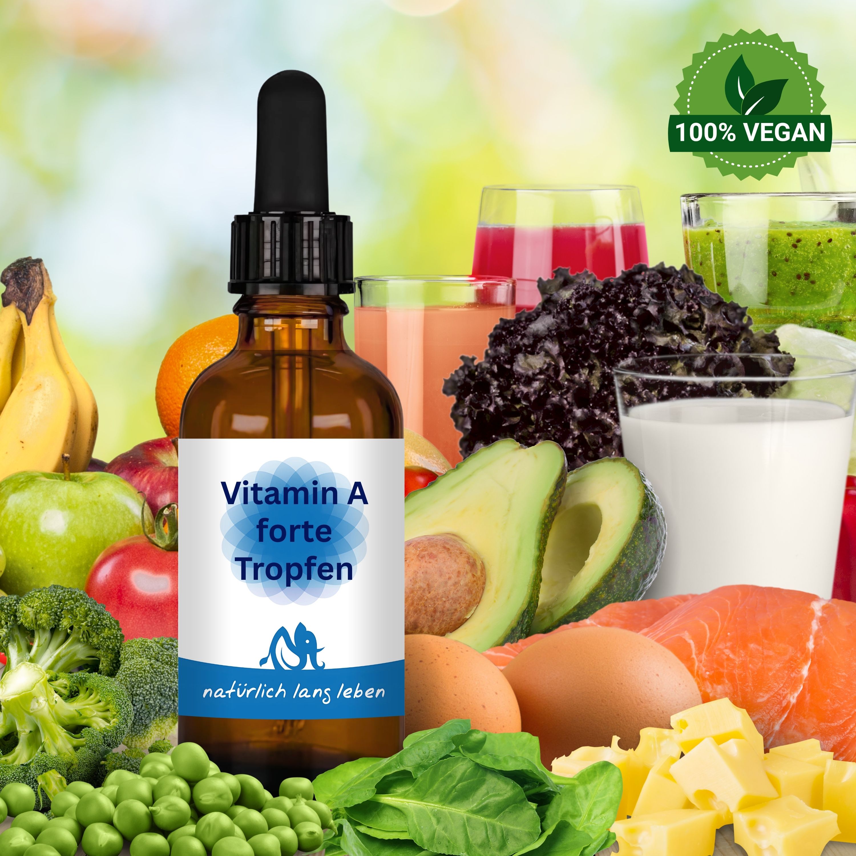 Braune Flasche mit Tropfer, Etikett "Vitamin A forte Tropfen". Umgeben von Obst, Gemüse, Eiern, Fisch und Getränken. Vegan-Siegel.