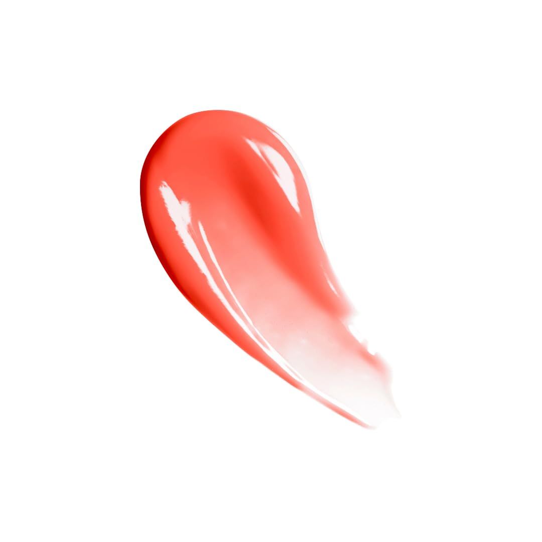 Korallenfarbener Lippenöl-Abstrich. Glänzende Textur auf weißem Hintergrund.