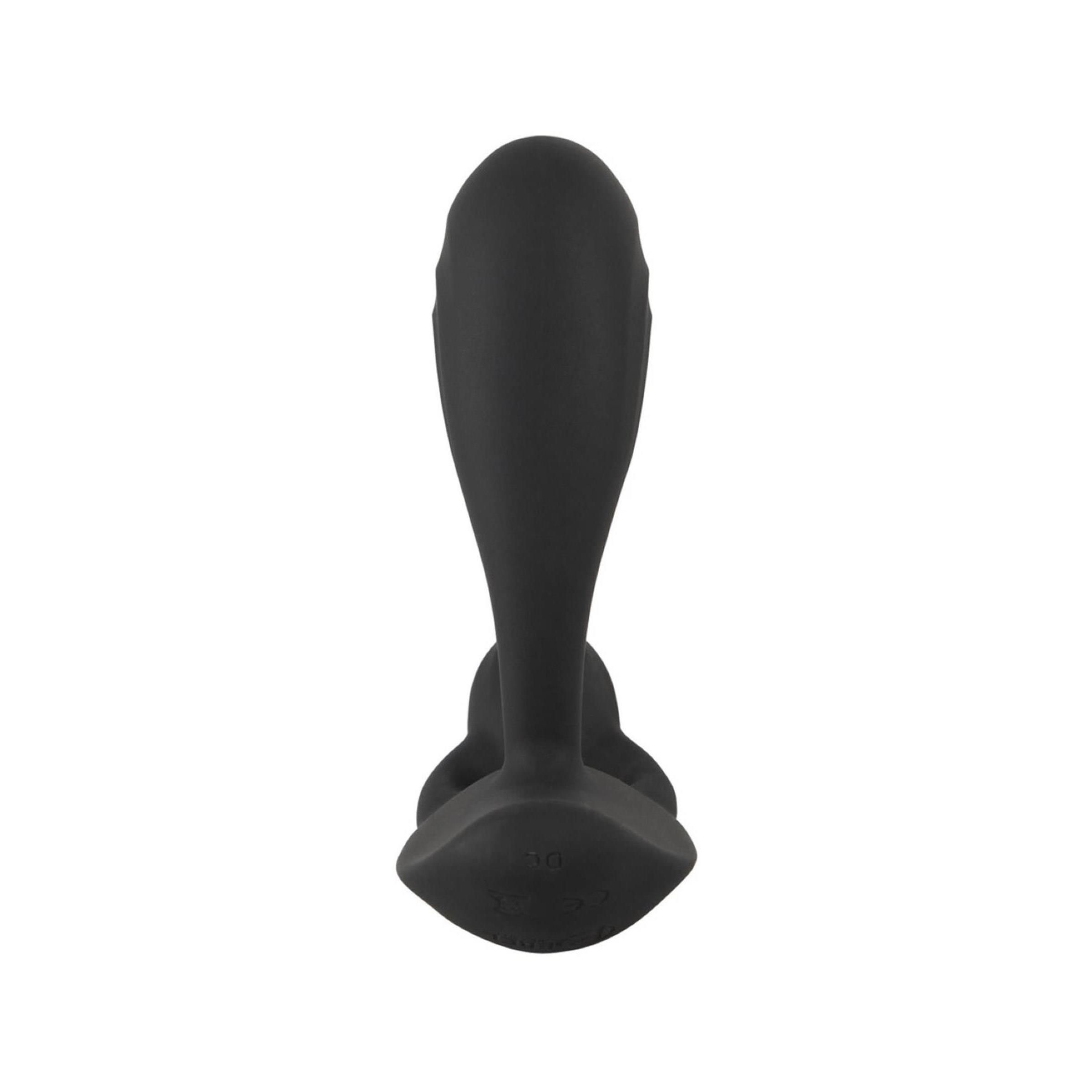 Schwarzes Wellness-Produkt mit zwei abgerundeten Enden und einem länglichen, gebogenen Teil. Ansicht von vorne.