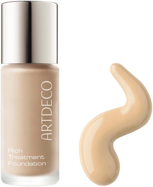 ARTDECO Rich Treatment Foundation Flakon mit silbernem Deckel und einem Swirl der Foundation daneben.