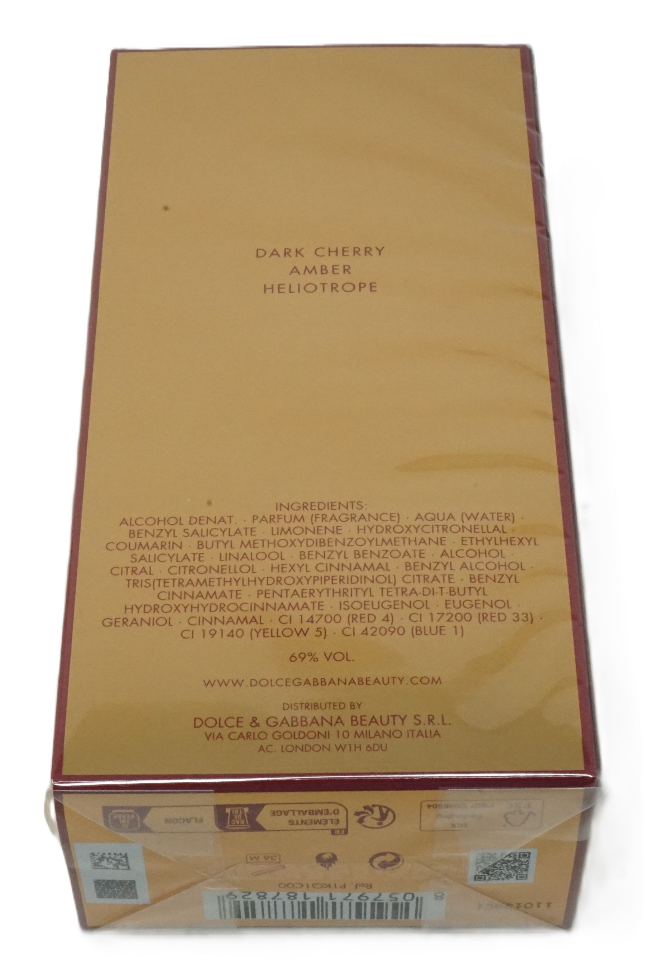 Rückseite der Verpackung mit Inhaltsstoffen und Informationen. Enthält Text wie 'DARK CHERRY', 'AMBER', 'HELIOTROPE' und '69% VOL'.