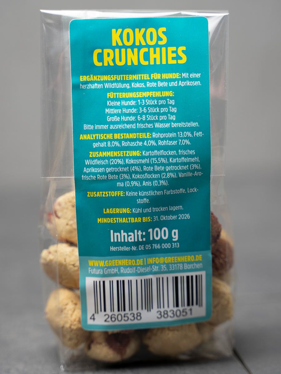 Rückseite einer transparenten Tüte mit Kokos Crunchies. Aufdruck mit Produktinformationen, Inhaltsangabe, Mindesthaltbarkeitsdatum und Barcode.