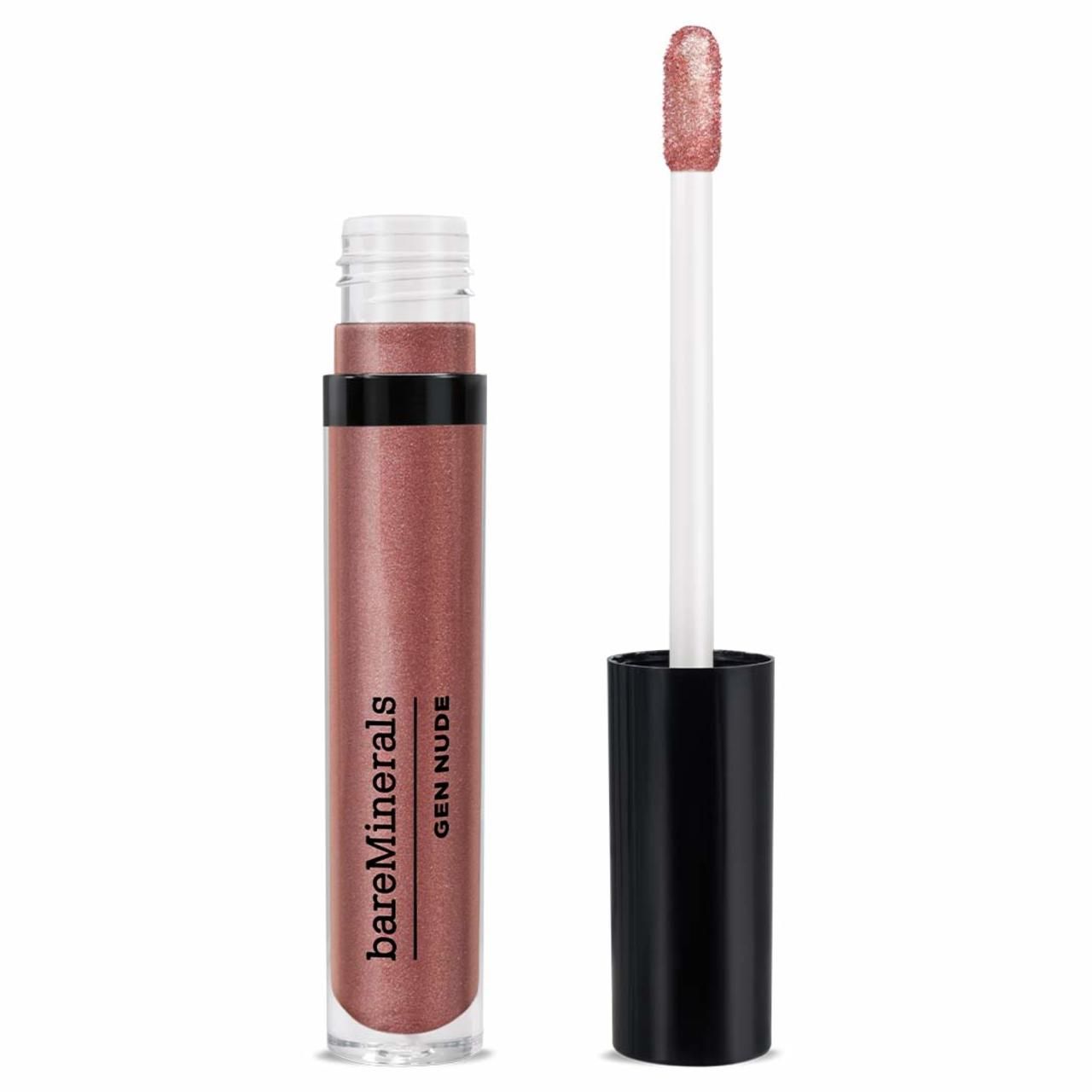 bareMinerals Gen Nude Lip Lacquer. Tube geöffnet, Applikator sichtbar. Rosa-goldener Farbton. Schwarzer Deckel. Markenname und Produktname sind sichtbar.