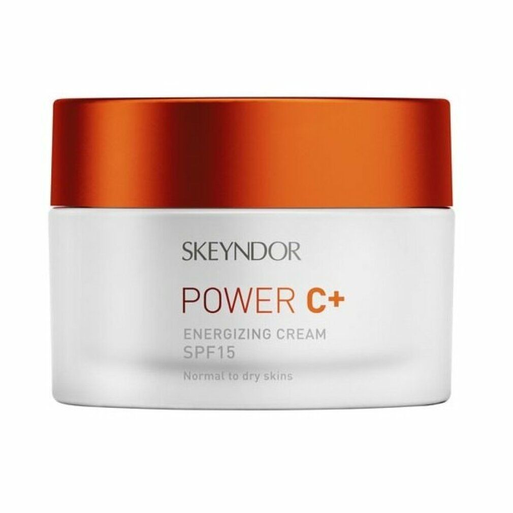 Weißer Tiegel mit orangefarbenem Deckel. Aufschrift SKEYNDOR, POWER C+, Energizing Cream SPF15.