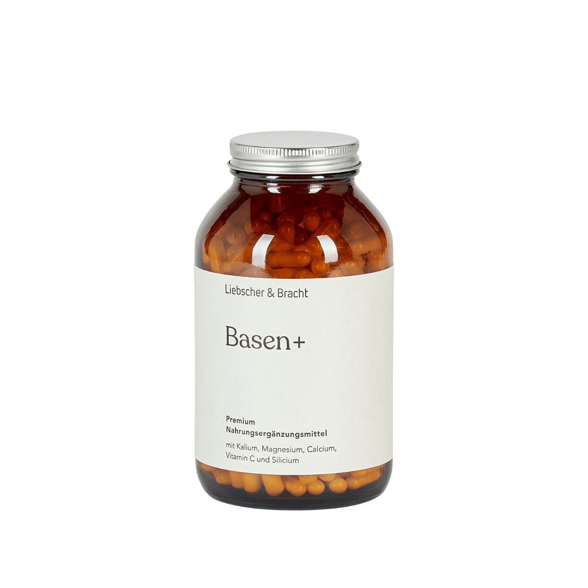 Braune Glasflasche mit silbernem Deckel. Etikett mit "Basen+" und Produktinformationen. Kapseln sichtbar.
