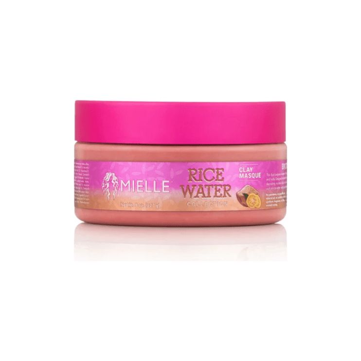 Rosa Tiegel mit pinkfarbenem Deckel. Aufschrift: Mielle Rice Water Clay Masque.