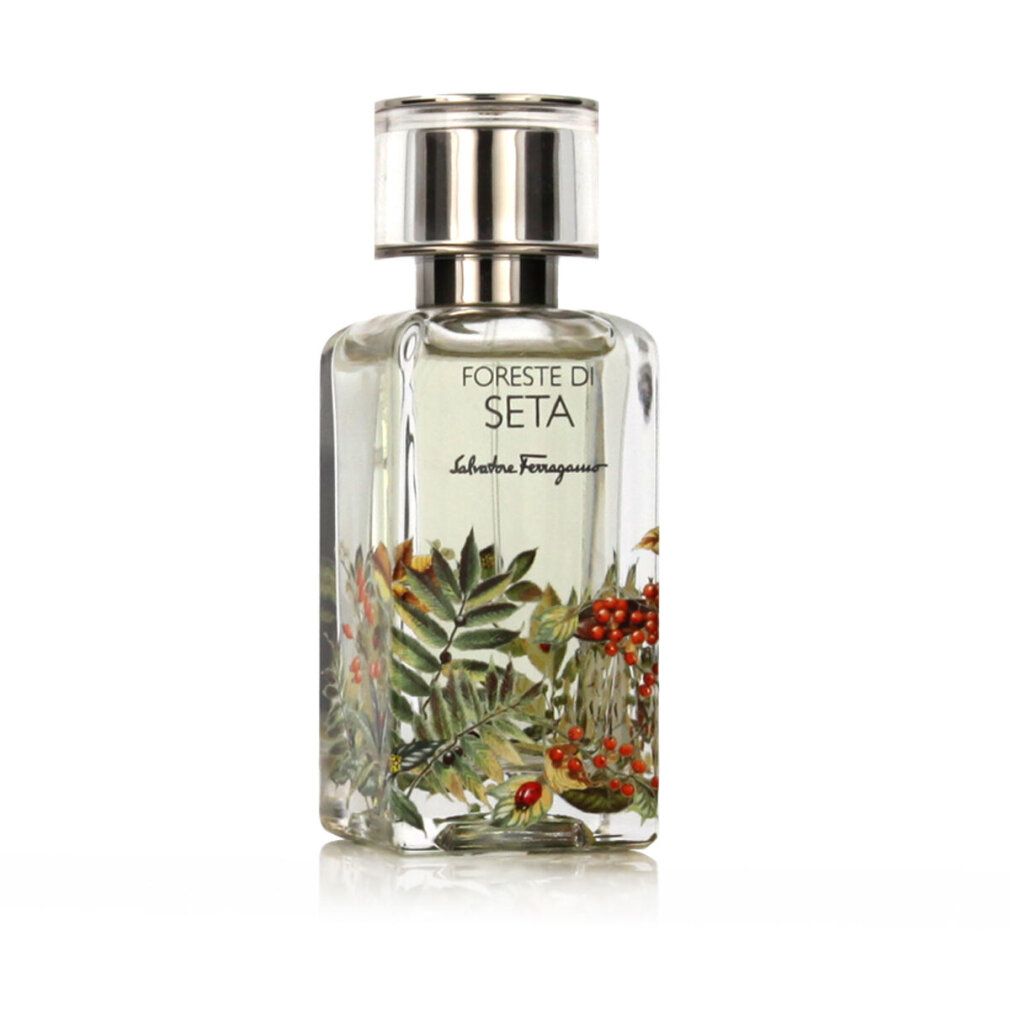 Salvatore Ferragamo Foreste di Seta Eau de Parfum Flakon mit silbernem Verschluss und botanischem Motiv.