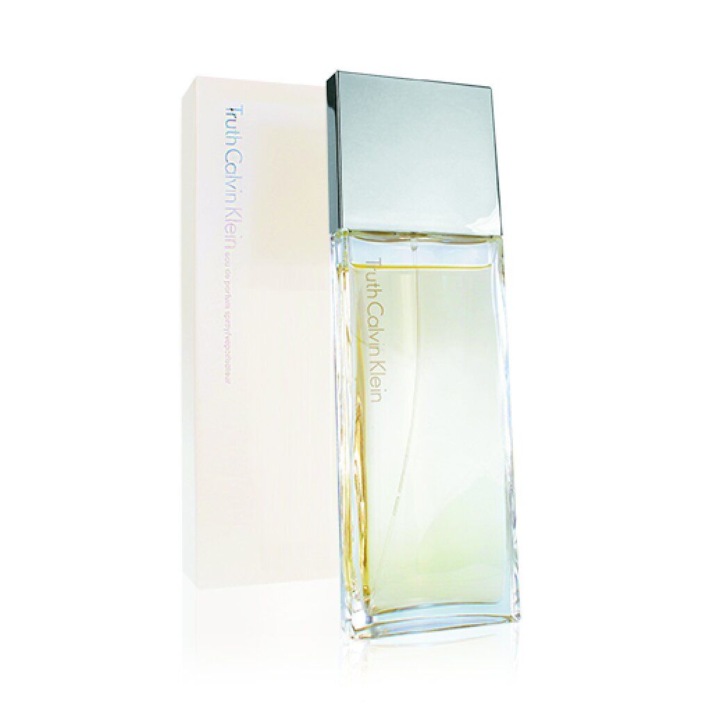 Parfümflasche und Verpackung. Flasche rechteckig, transparent. Verpackung beige, rechteckig. Aufschrift: Truth Calvin Klein.