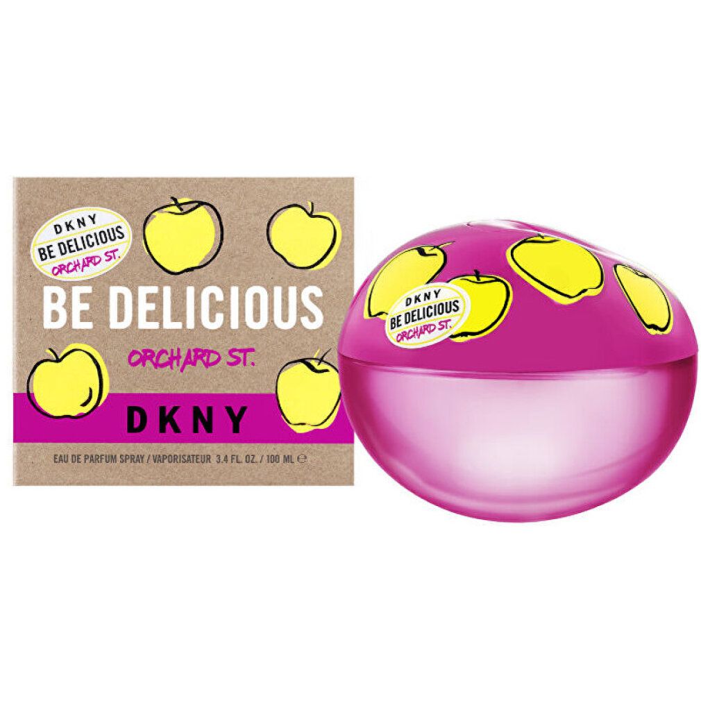 Pinkfarbener Flakon und Karton. Auf dem Flakon gelbe Apfel-Illustrationen. Aufschrift: DKNY BE DELICIOUS ORCHARD ST. Auf dem Karton: gleiche Aufschrift.