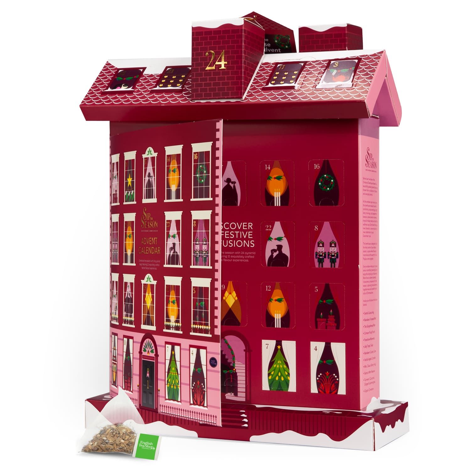 Roter Adventskalender in Hausform mit 24 nummerierten Fenstern und einer Schublade mit Teebeuteln.