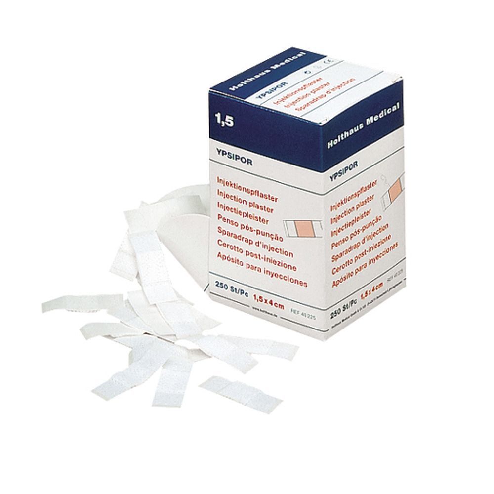Box mit weißen Injektionspflastern. Aufschrift: YPSIPOR, Holthaus Medical. Pflaster liegen lose daneben. Größe: 1,5 x 4 cm.